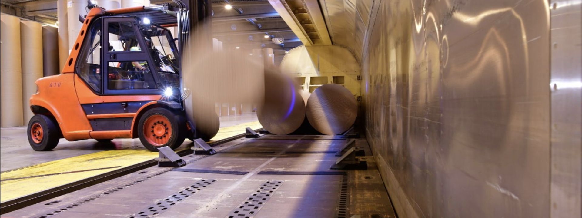 Forklift truck in warehouse